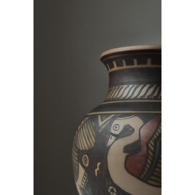 A beautifully hand-painted art nouveau terracotta vase by l. Hjorth, denmark, dating from the 1920s. The vase features a...