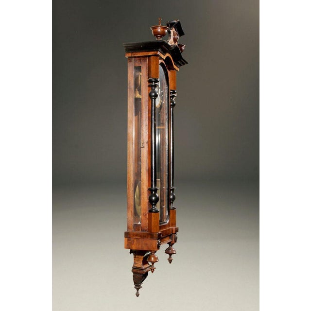 A wonderful antique Vienna regulator clock dating to circa 1890, featuring a richly finished walnut case accented with...