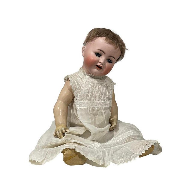 Bisque doll by Simon & Halbig for Kämmer Reinhardt, Germany, ca 1900 A lovely bisque doll of 60 cm long with moving eyes,...