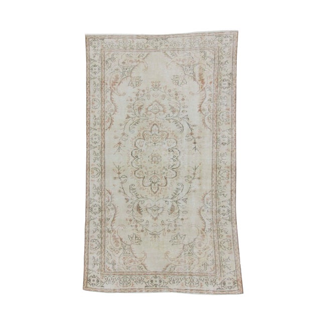 1960s Vintage Washed Out Turkish Oushak Rug- 5′6″ × 9′4″ For Sale