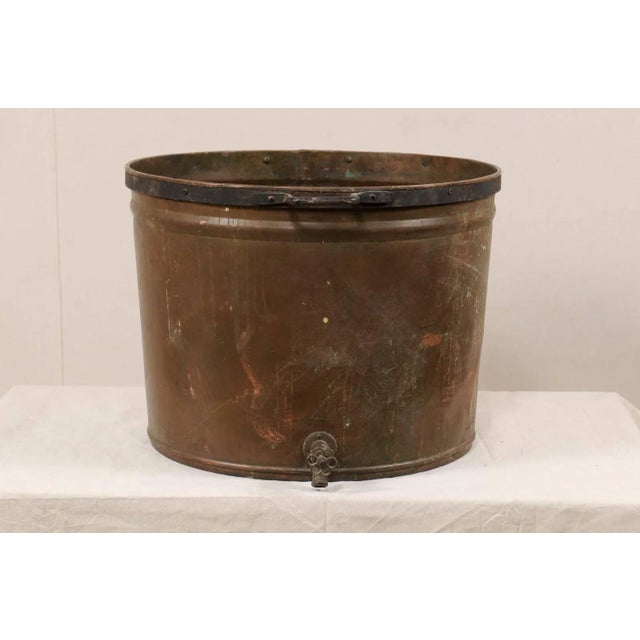 A vintage French large-sized copper kitchen pot. This mid-20th century French farmer's kitchen pot is nicely sized at 2 ft...