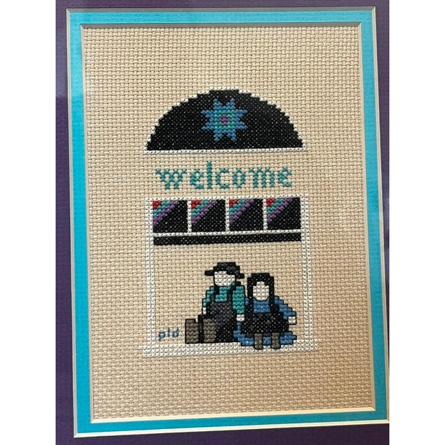Vintage framed cross-stich. Amish figures, welcome.