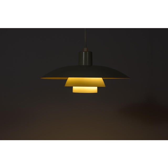 The ph 4/3 pendant lamp was designed by poul henningsen for the renowned danish manufacturer louis poulsen. Introduced in...
