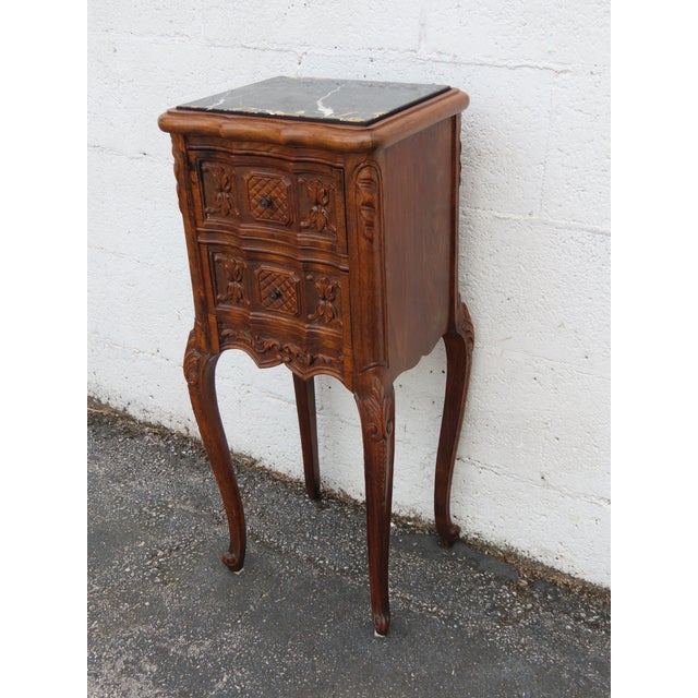 This classic Nightstand is made out of wood, solid wood, and marble. This Nightstand has a lovely French style and design,...