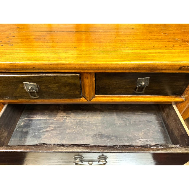 This exquisite vintage Asian side board boasts a unique blend of utility and ornate design, reflecting its rich cultural...