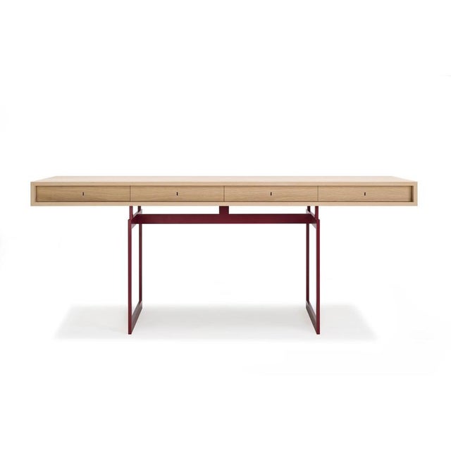 Bodil Kjaer, 1959 Red And White Stained Oak Office Desk For Karakter Coveted by renowned modernist architects Marcel...