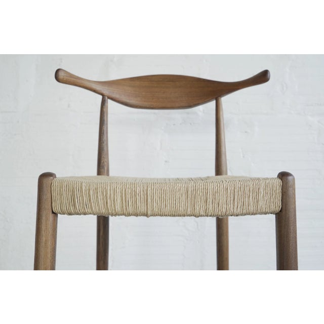 Vintage cow horn bar stool in the style of Hans Wegner. Refinished in-house at The Good Mod in Portland, OR. No maker's mark.