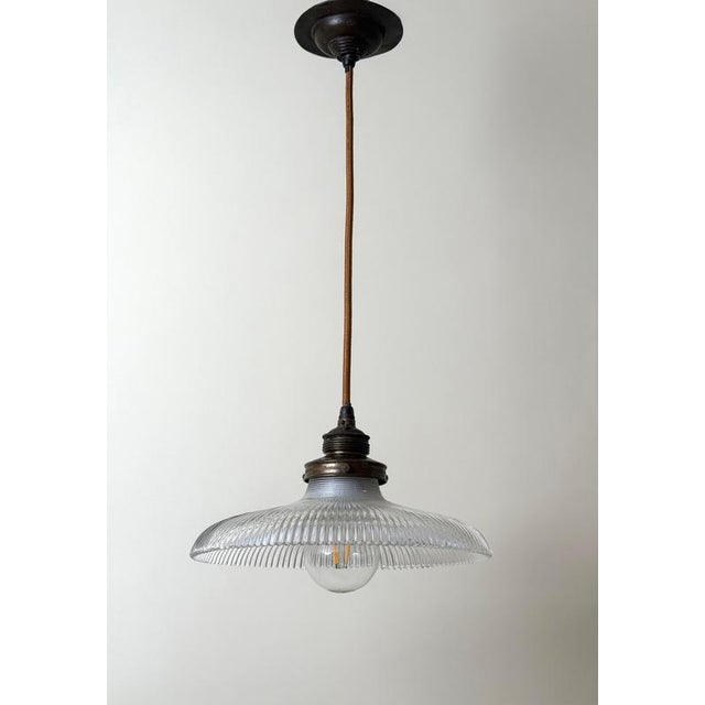 A rare and beautifully preserved early 20th-century pendant light, attributed to the renowned lighting manufacturer...
