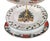 A festive four-tier serving stand assembled from complementary Christmas china patterns by Tienshan, Gibson Designs, and...