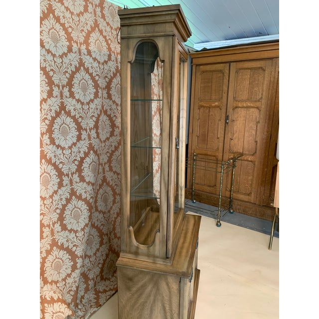 Here we have a darling Mid Century Obelisk Form Curio or display cabinet. All original, excellent condition. Nothing is...