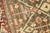 Fine quality Persian Heriz rug with an all-over design in greens and brown, circa 1920. Measures: 4'4" x 5'7".