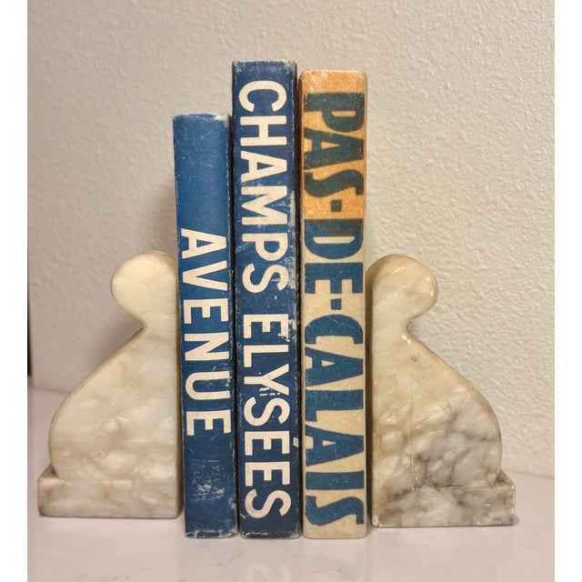 Originally just plain hardback books, E. Lawrence, Ltd. transformed these books into beautiful decorative objects sure to...