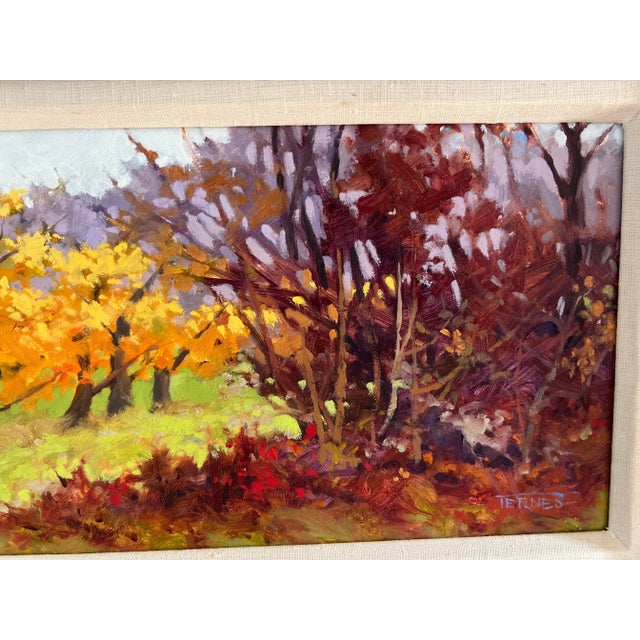 “Fall Orchard” by William Ternes – Framed Impressionist Oil on Board This vibrant Impressionist landscape by William...