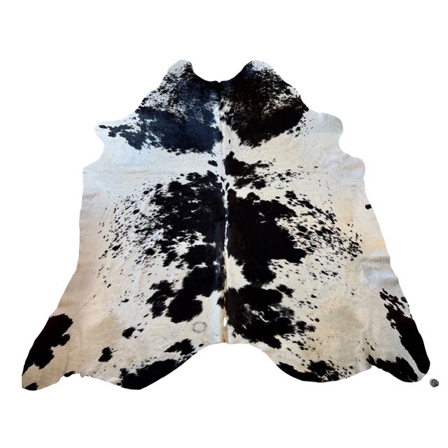 This extra large natural cowhide in a monochromatic black and white color way has a beautiful sheen. Every single hide is...