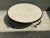 Showcasing understated mid-century elegance, this vintage round coffee table features an inset cast stone top with...