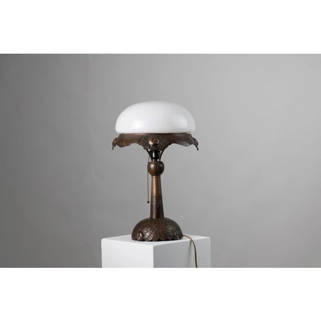 Art nouveau table lamp from Sweden. The lamp is from the early 20th century, from 1910 to 1915, and is hand made with a...
