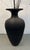 Corrugated cardboard vase rendered in matte black by Flute, Chicago circa 1980s. Best to use with dried arrangements....