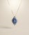 14K gold pendant necklace with clustered blue sapphires and diamonds 14K gold chain with spring-ring clasp Box Chain...
