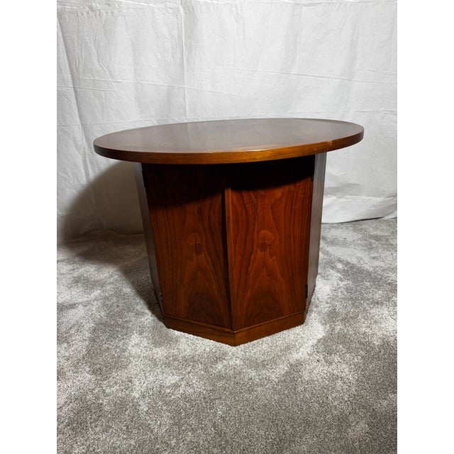 Jack Cartwright for Founders Mid-Century Octagon Side Table Crafted in richly figured walnut, the table features an...