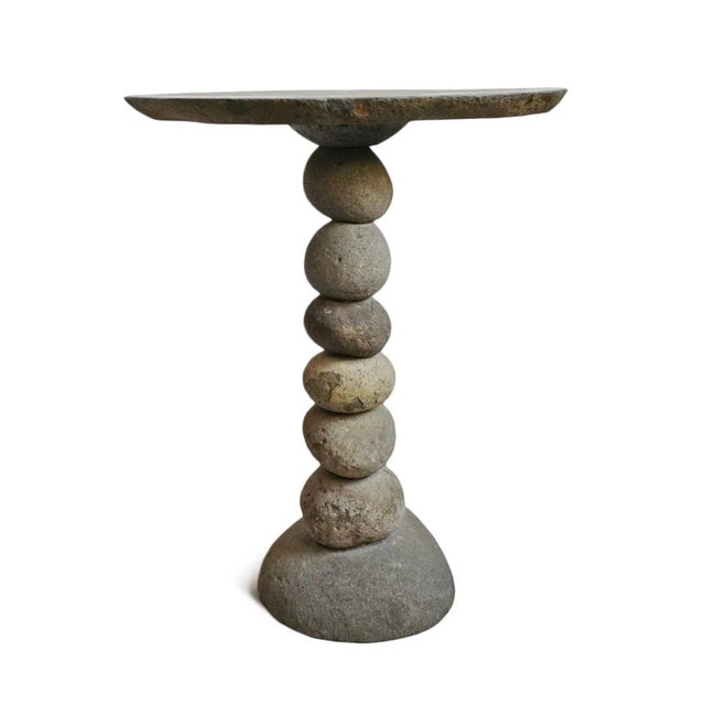 Hand crafted vintage stacked river rock outdoor bistro table. Beautiful organic modern style piece with natural tones and...