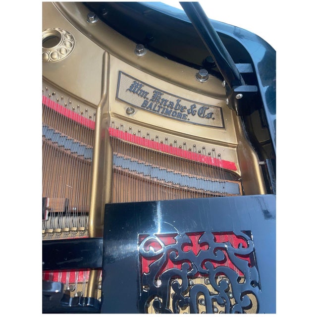 An exceptional W.M. Knabe & Co. Gold Medal concert grand piano, dating to the early 20th century and presented in a...