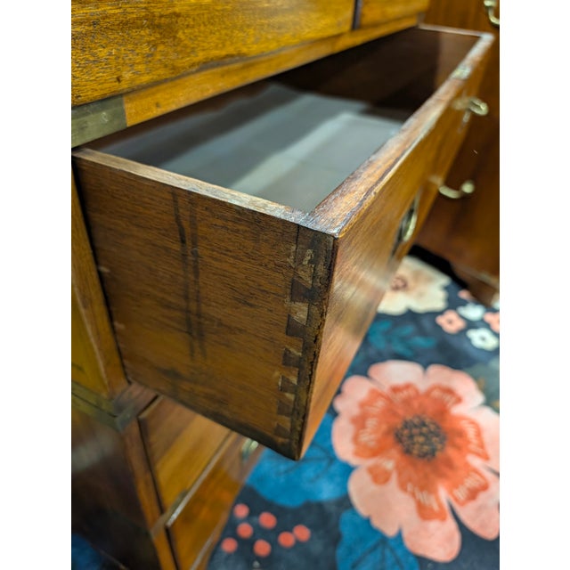 Beautiful 2 piece Victorian - British wooden campagne chest of drawers featuring rich, warm brown wood tones, distinctive...