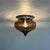 Dijkstra ‘Drop’ ceiling lamp from the 1970s; brown smoked glass in the shape of a drop with an aluminum base. This lamp...