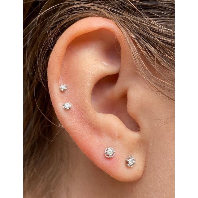 Simple and elegant natural diamond stud earrings set in 14k Gold plated 925 sterling silver for long-lasting and durable...