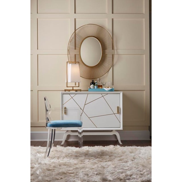 Bell shaped shade suspended from an antique brass frame and base. 21h x 10w x 7d Shade Dimensions: top(6 x 6) bottom(8 x...