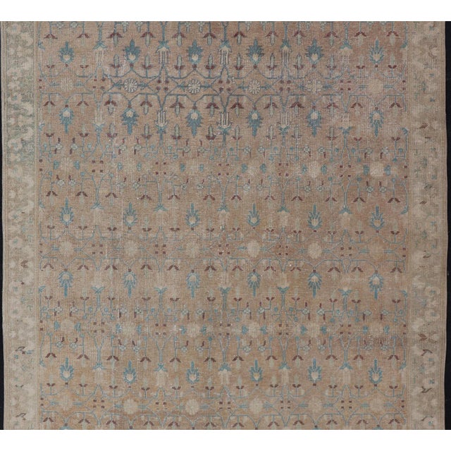 Vintage Turkish Oushak rug with overall Sub-geometric design paired with Delicate colors, Light blue, soft pink, taupe's....