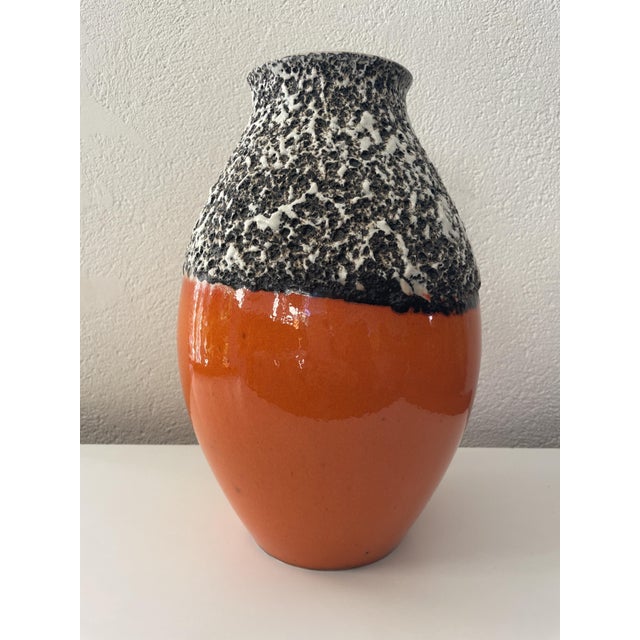 Orange Glazed Fat Lava Oval Vase by Trude Carstens for Carstens Tönnieshof, 1970, in Flawless conditions. Designed 1970 to...