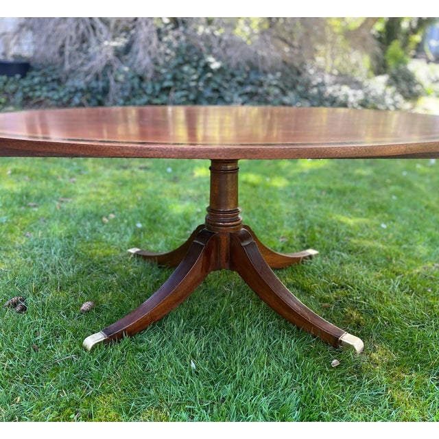 Oval Coffee Pedestal Table Cherry Mahogany Inlaid Vintage Satinwood Ebony Inlays. This exquisite Oval Coffee Table has a...