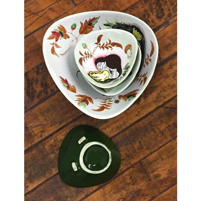 Vintage hand painted salad bowl set. An array of vegetables in the design including avacado, peppers, mushroom, beets. One...