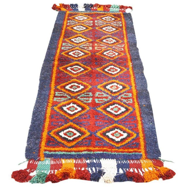Vintage Uzbek tribal hand knotted rug with natural colors and fine weave.
