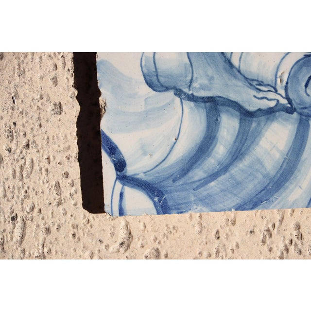 This original Antique Tile depicting a Foot on a Rocaille Ribbon was made in Portugal in the period of 1706–1750! The tile...