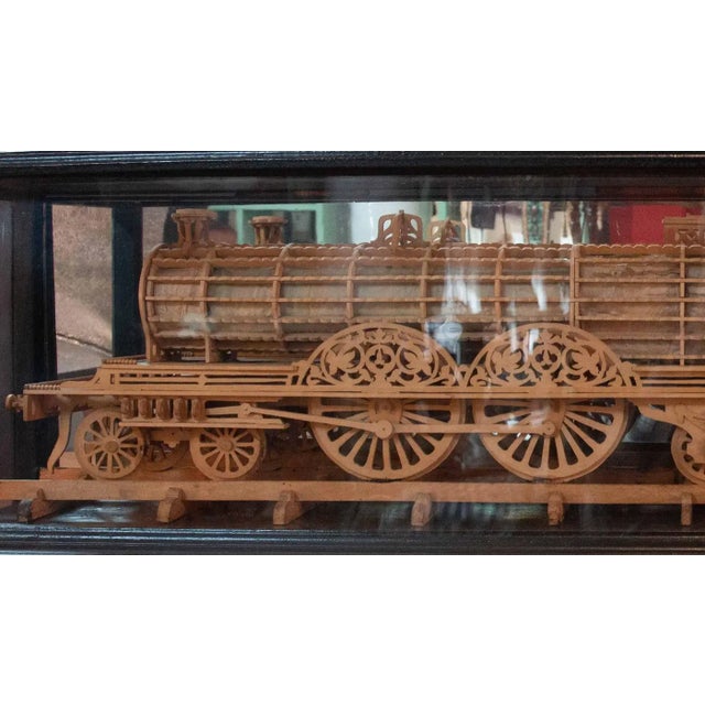 American Carved Wood Model of a Locomotive in Black Lacquered and Glass Case For Sale - Image 3 of 4