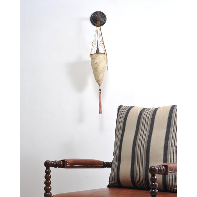 An elegant pair of signed Fortuny “Cesendello” wall sconces produced by Venetia Studium in Venice, Italy. Each lamp is...