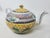 Here is a vintage famille rose teapot made in Hong Kong, China. The intricate details of this piece include dragons and...