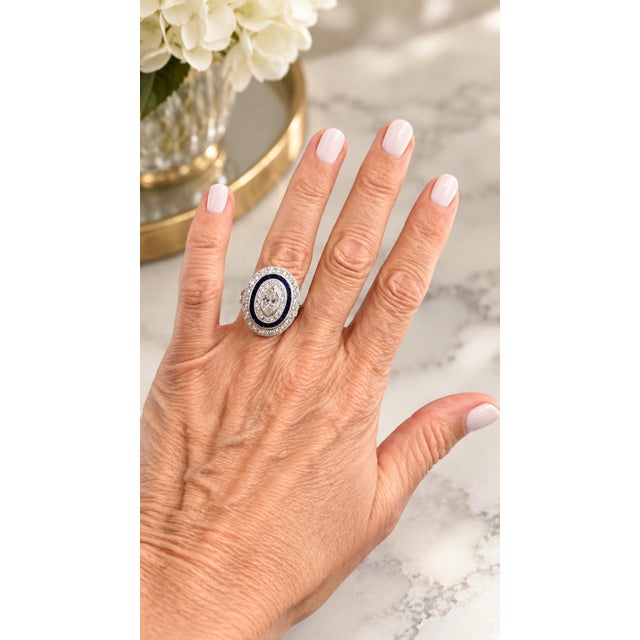 A striking and finely executed Art Deco navette ring crafted in platinum, dating to circa 1925. The elongated silhouette —...