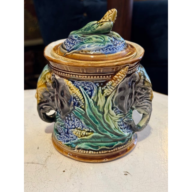 Gorgeous 19th century Majolica pottery tobacco jar, attr. to Onnaing Mfg Co., France. Elephant and corn motif; vibrant,...