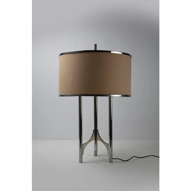 Lamp with four-arm chromed metal structure, magnetic plates in white painted metal, paper-fabric lampshade. Sciolari...