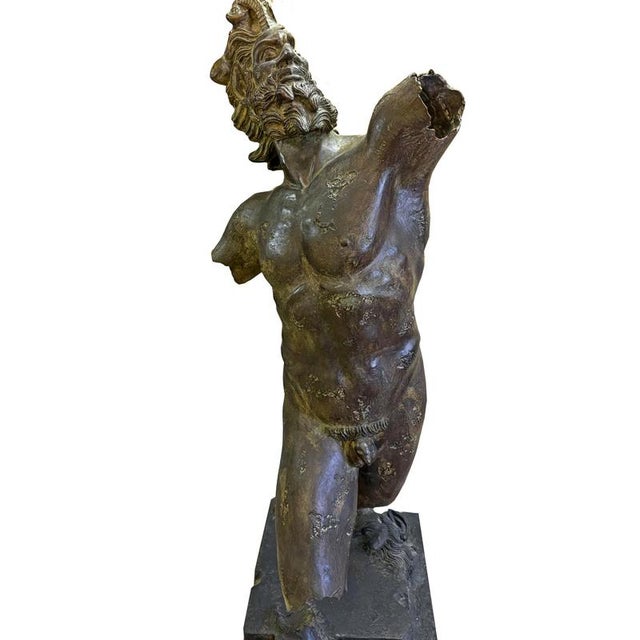 Dimensions: 13 cm (height) x 53 cm (width), 60 cm (depth); bronze with a green fire-patina. The satyr is perhaps the...
