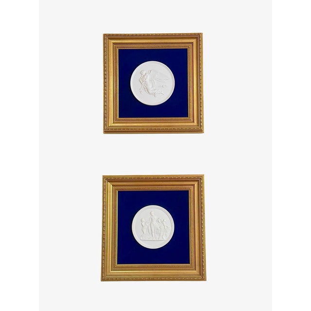A striking pair of framed antique Parian bas relief plaques by Royal Copenhagen, produced circa 1870–1890 and cast from...