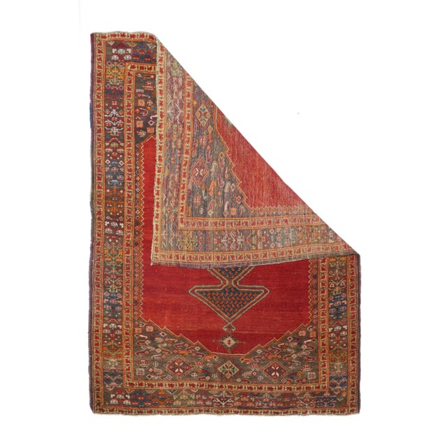 The solid red sub-field presents a doubly outlined, triangle pendanted dark blue quatrefoil medallion., with a pattern of...