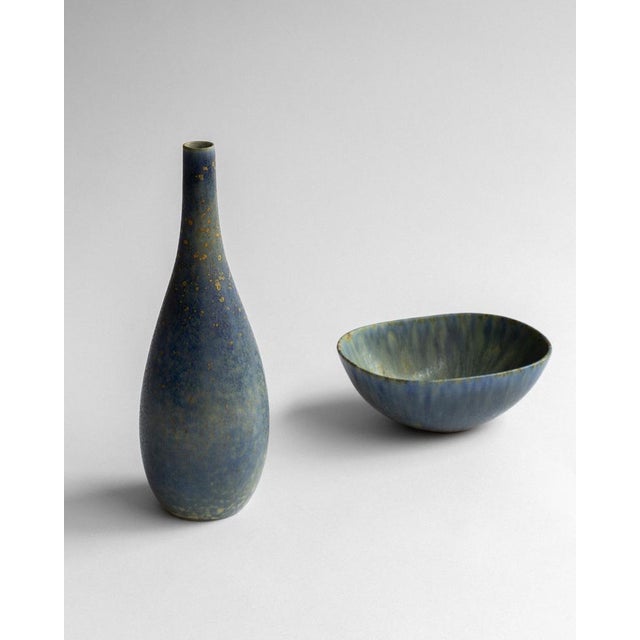 An elegant pair of studio ceramics by the renowned Carl-Harry Stålhane for Rörstrand, Sweden, 1950s. The set comprises a...