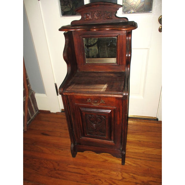 This is a Rare! Antique French Country Potato Bin Cabinet. This Small Cabinet is made of a Dark Wood and is Extremely...
