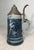 This Antique Whites Utica Stoneware "Prince of Pilsen" pewter lidded stein is a collectible beer accessory with a unique...