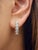 These exquisite diamond earrings are meticulously crafted in 14k white gold, showcasing modern elegance. Featuring a...