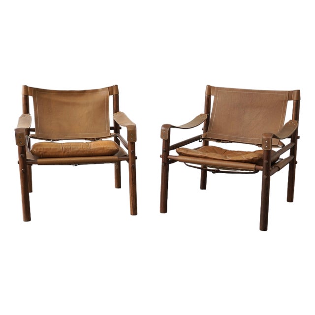 Pair of Arne Norell “Safari” Rosewood Lounge Chairs, Model Scirocco — Sweden, 1960s For Sale