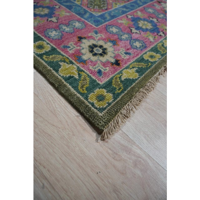 Penelope Kazak Green Hand Knotted Wool Rug, Country of Origin: India. This exceptional piece masterfully reinterprets the...